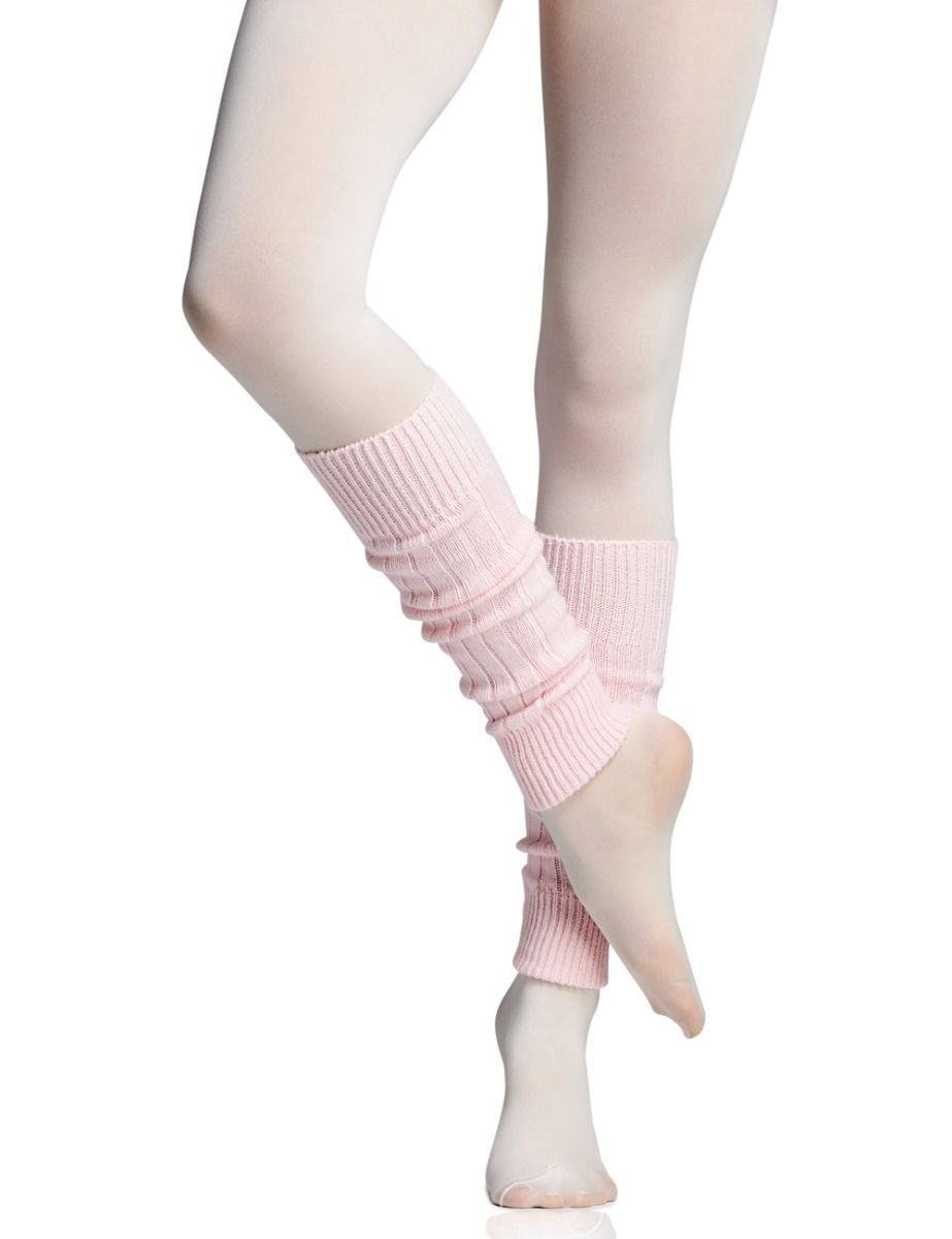 Figure Skate Leg Warmers 16 Inches in light pink worn over white tights, ideal for staying warm and stylish during ice skating practice.