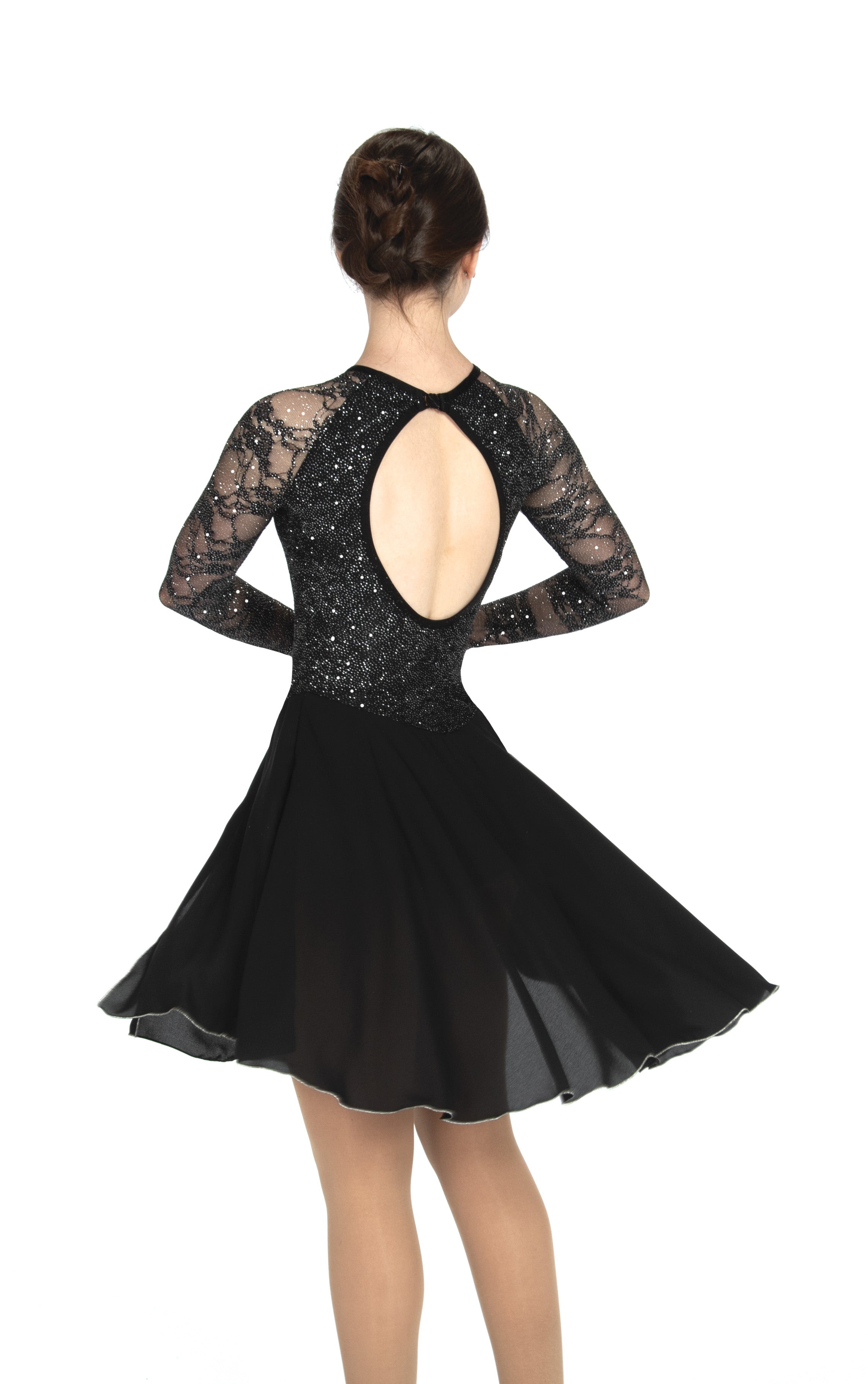 Back view of JR104 Onyx Dance Figure Skate Dress featuring a keyhole cutout and flowing knee-length skirt, perfect for competition wear.