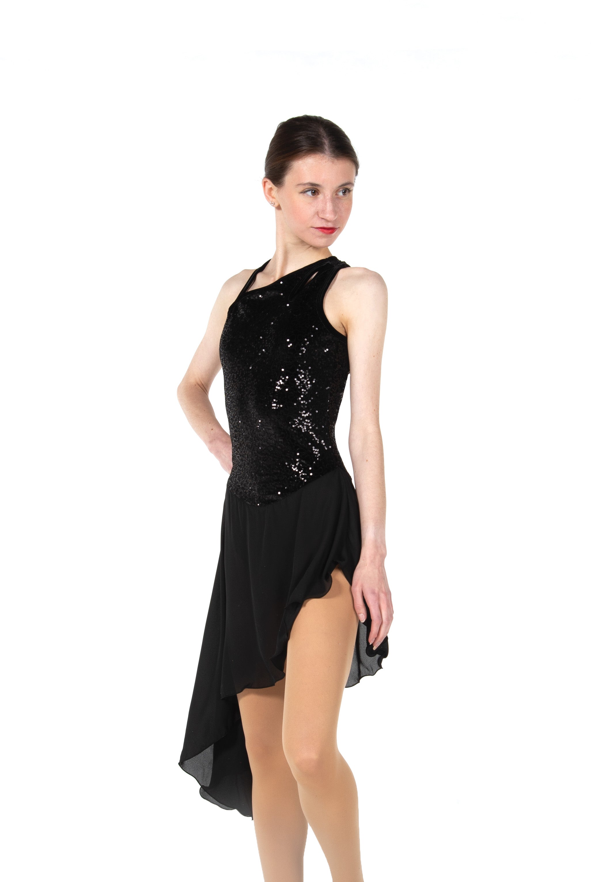 JR106 Sequin Dance Skate Dress featuring a sleek black sequin bodice and flowing angled skirt, designed for competition and performance wear.