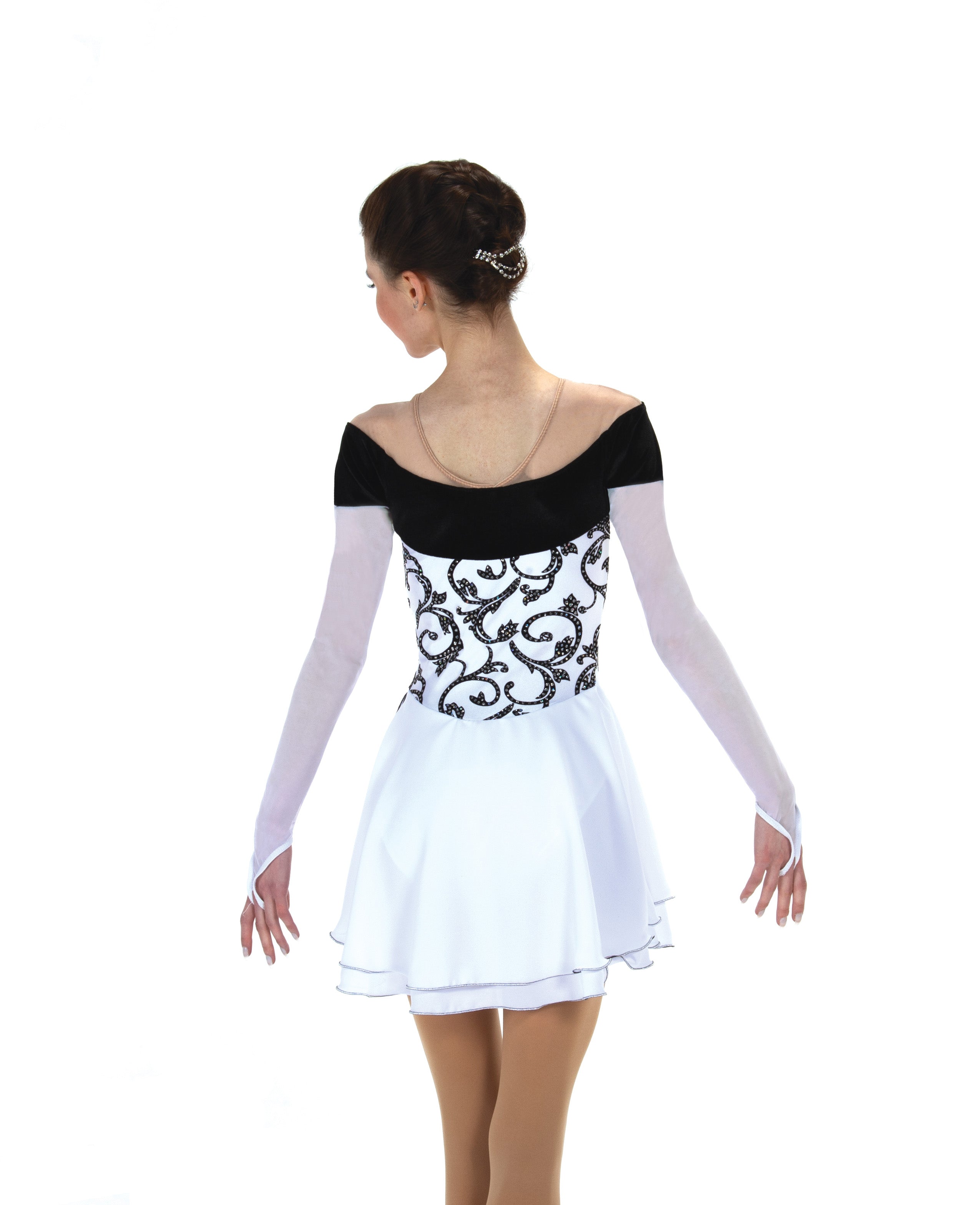Rear view of JR532 Dance Skating Dress in black and white, featuring wide velvet trim and layered chiffon skirt for graceful movement.