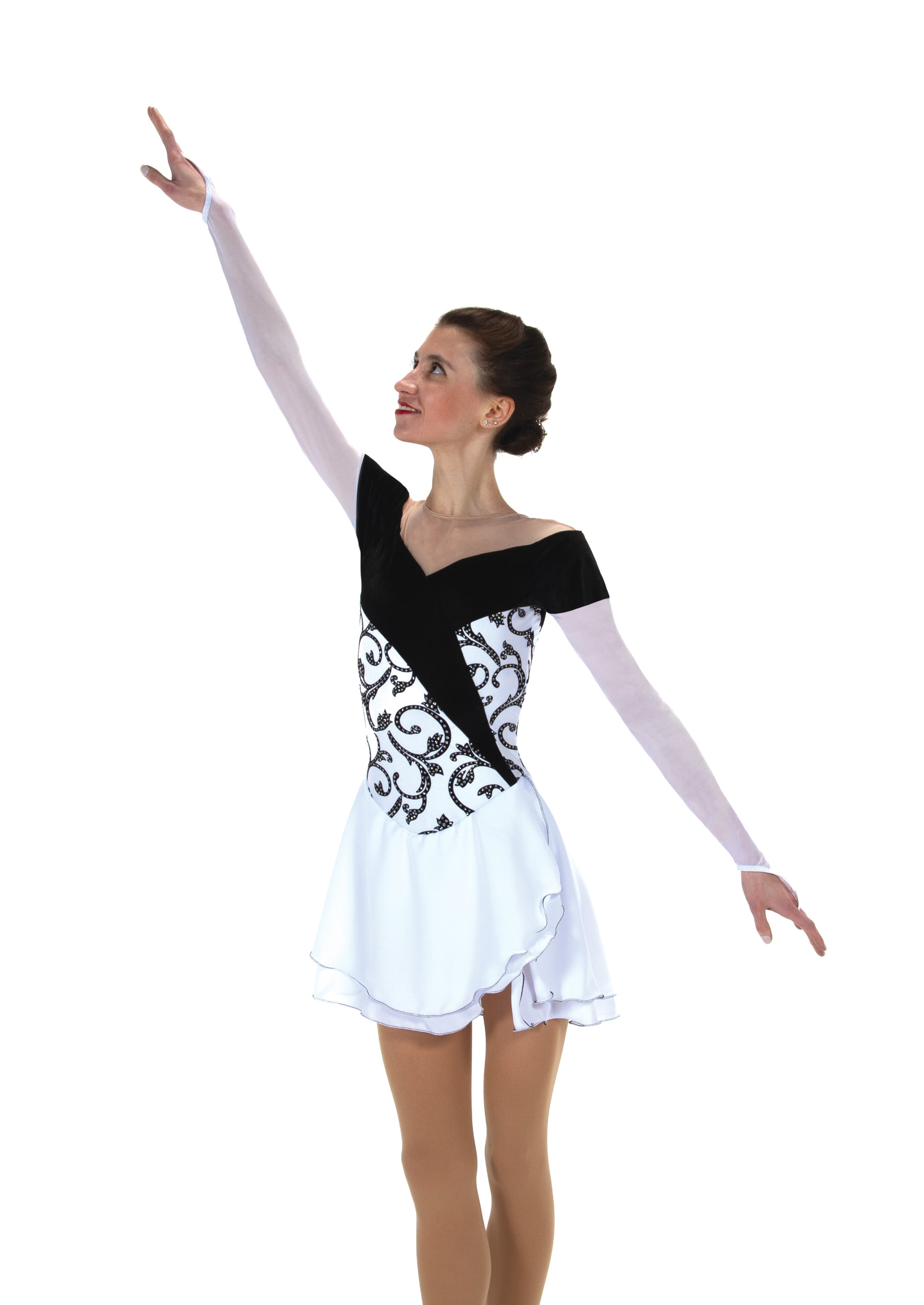 JR532 Dance Skating Dress in black and white with glitter flocked Lycra and sheer mesh sleeves. Elegant choice for figure skating routines.