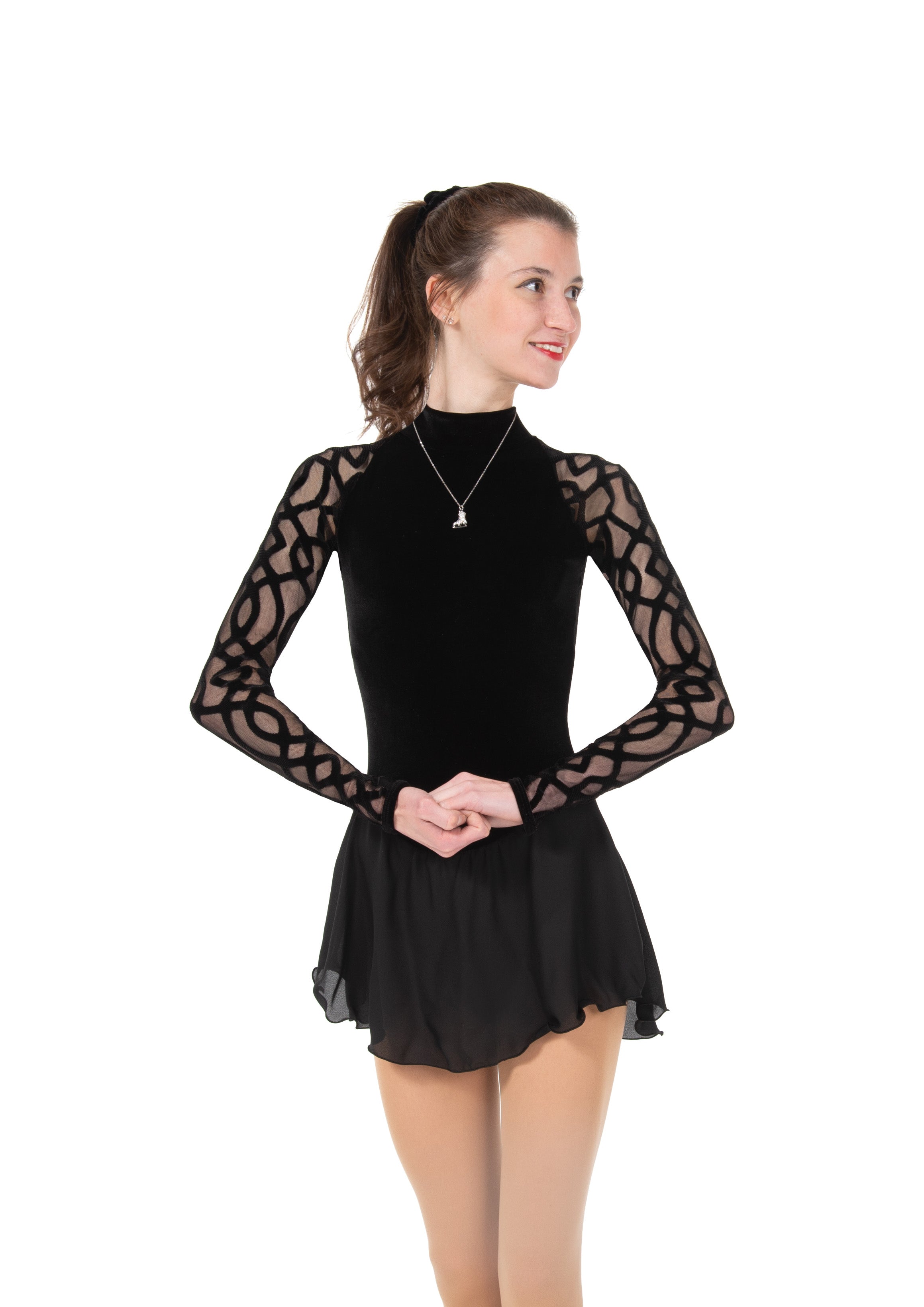 JR86 Serpentines Skate Dress in black velvet with sheer mesh sleeves and georgette skirt, ideal for figure skating performances and competitions.