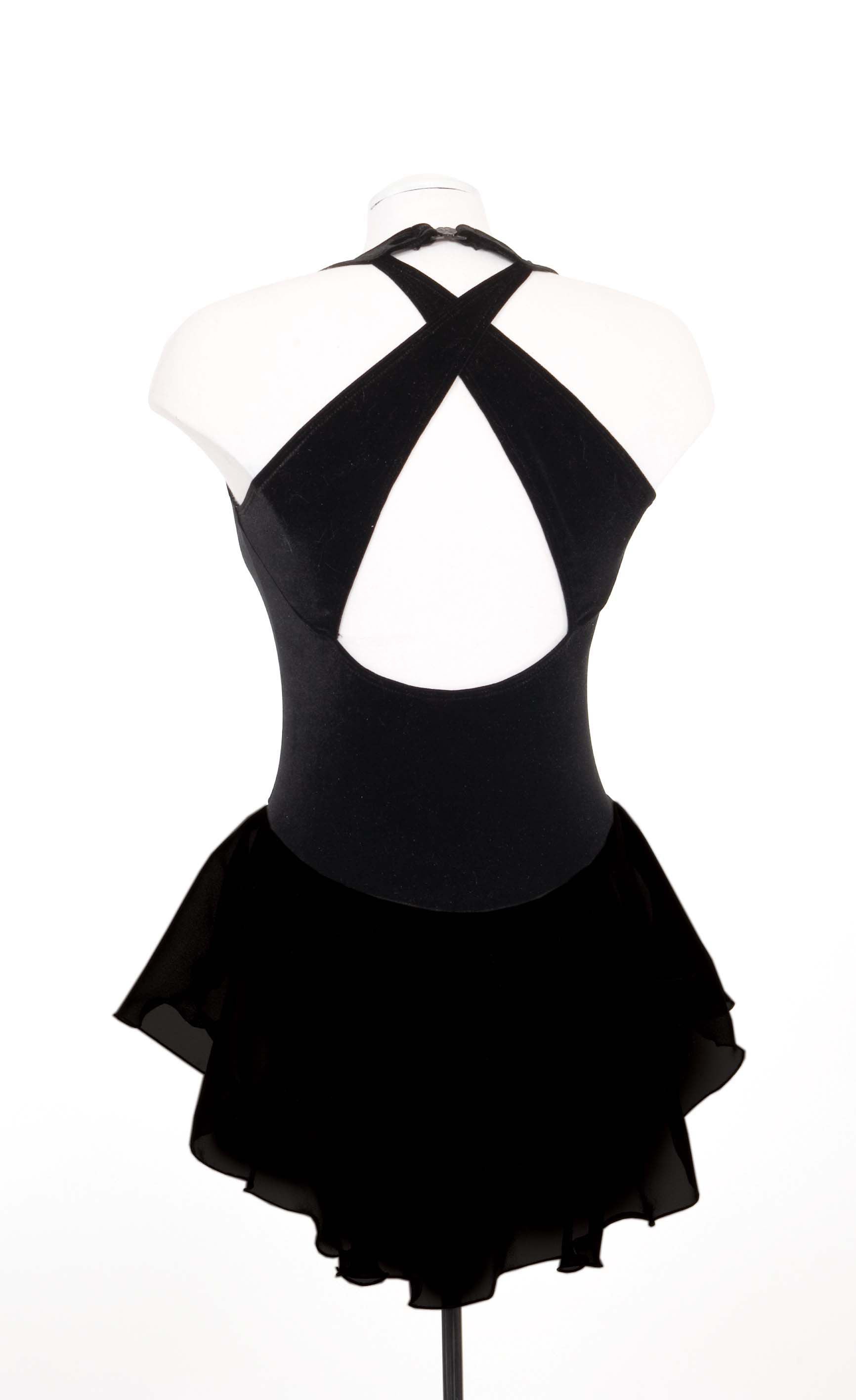 Back view of JR88 Trilogy Dance Skating Dress in black velvet featuring crisscross straps and open back design, ideal for figure skating.