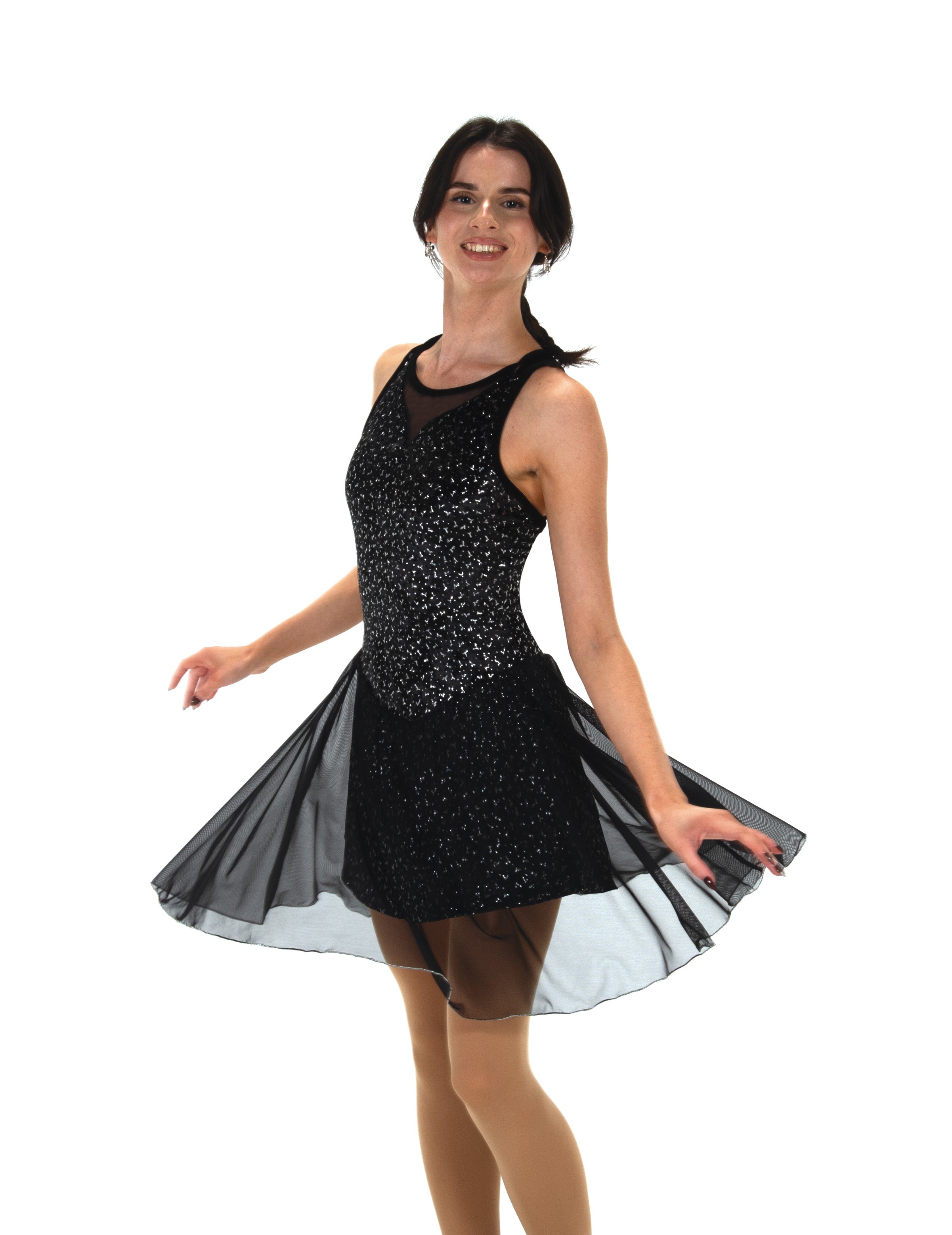JR99 Sheer Coincidence Skate Dress in motion, showcasing flared mesh skirt and sparkly velvet top. Perfect for dance or figure skating routines.