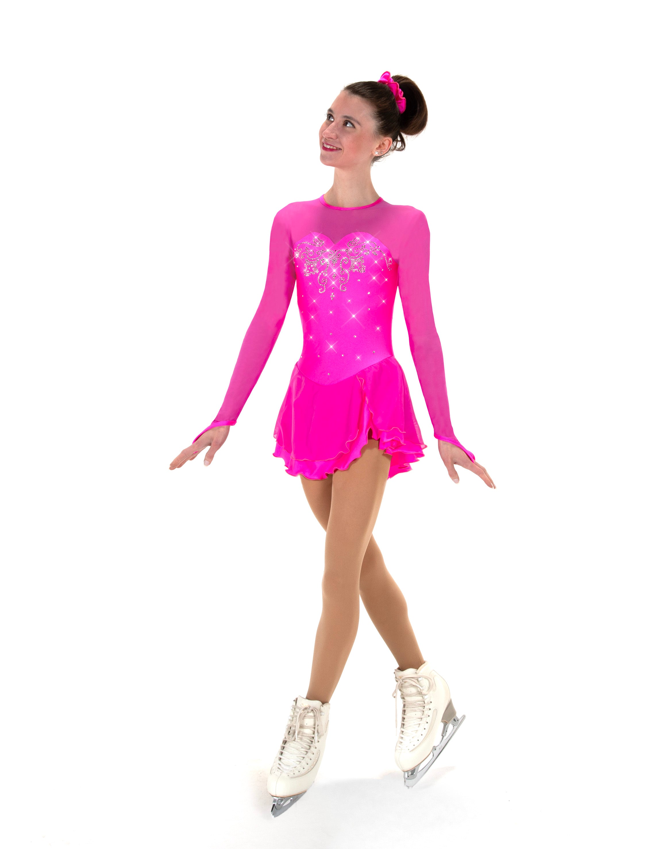 Pink figure skate dress with skater wearing white skates