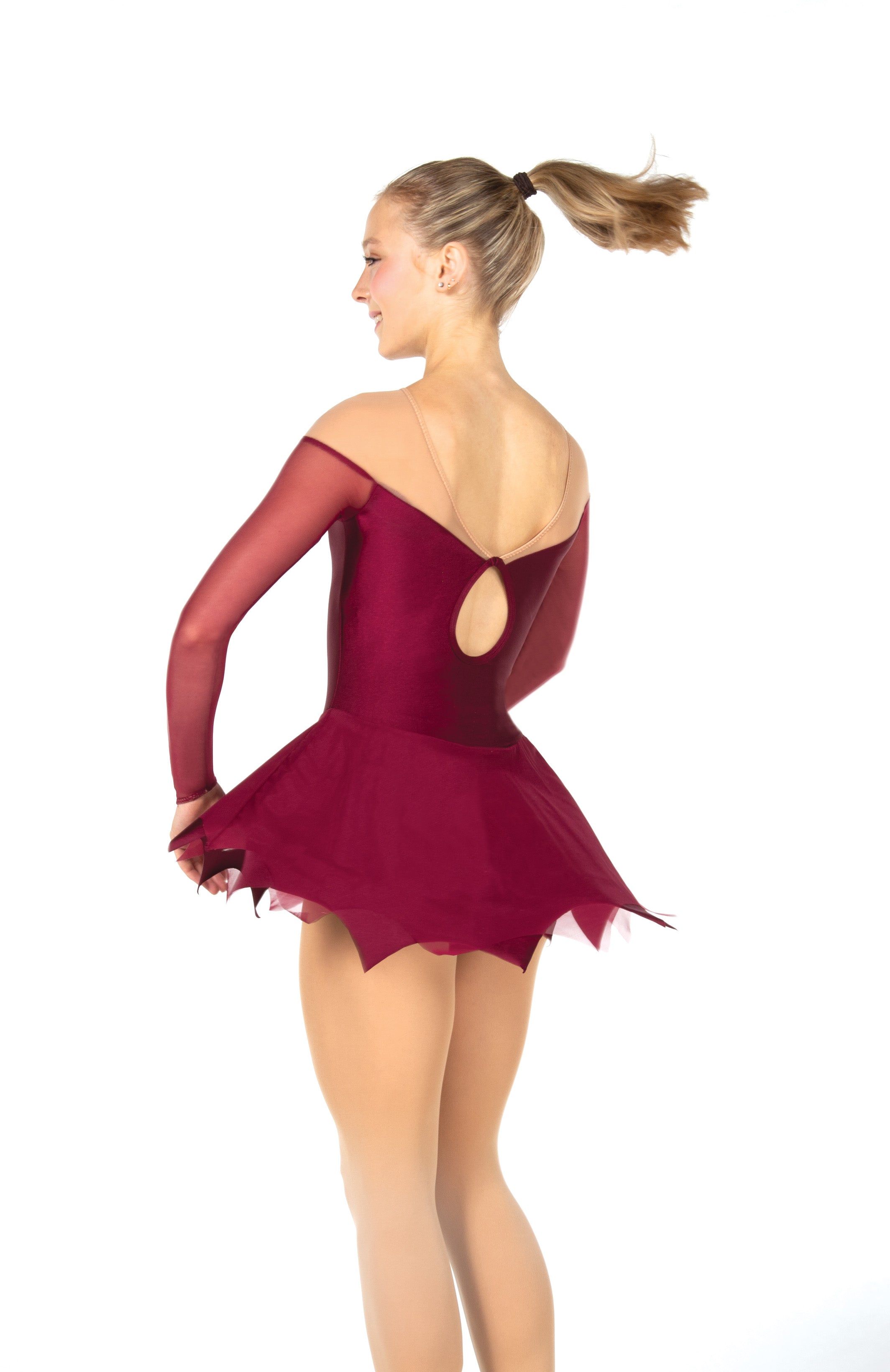 Side view of wine figure skate dress with mesh sleeves