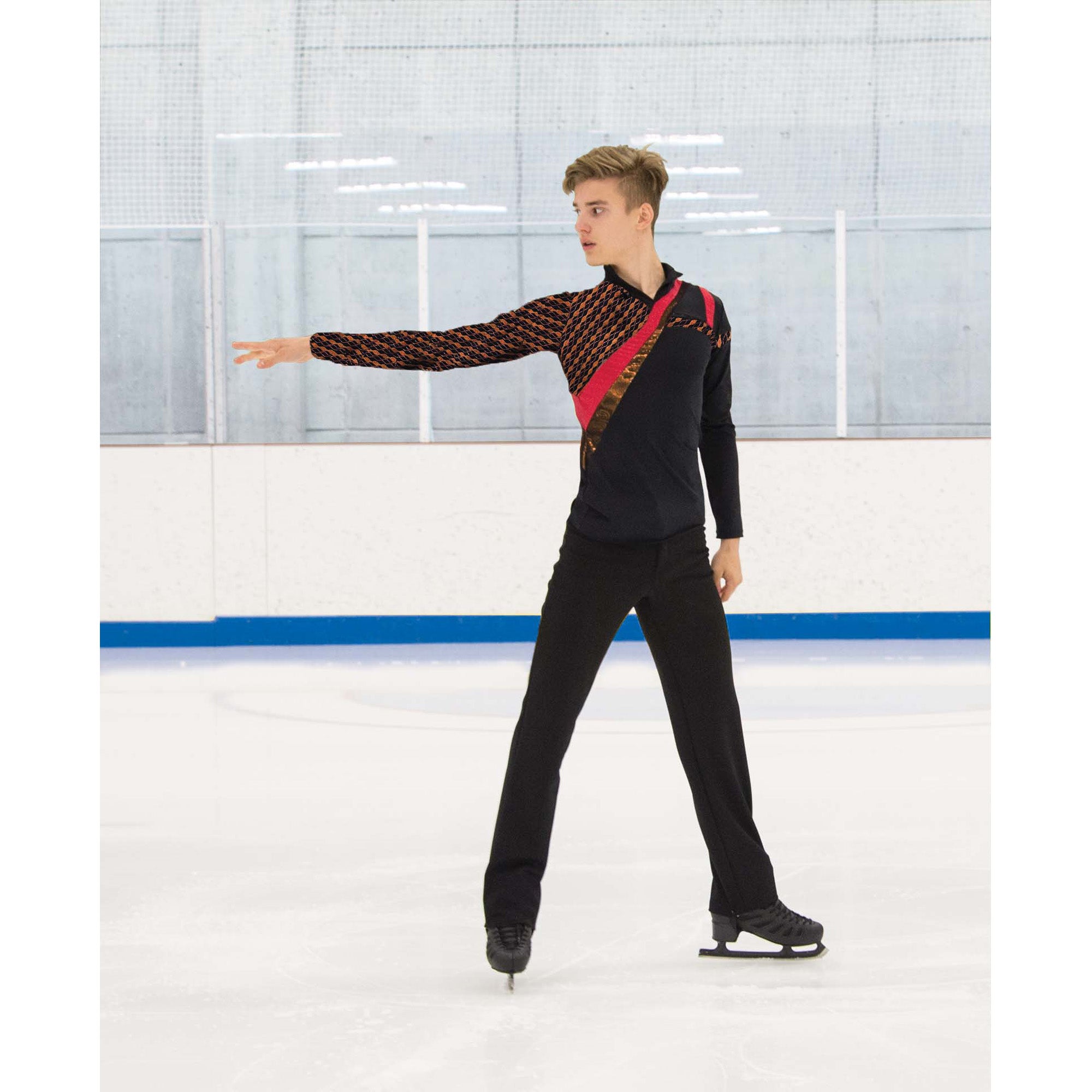Figure skater wearing the Mens Power Point Shirt on ice, showcasing its dynamic red and bronze design and sleek fit for performance.