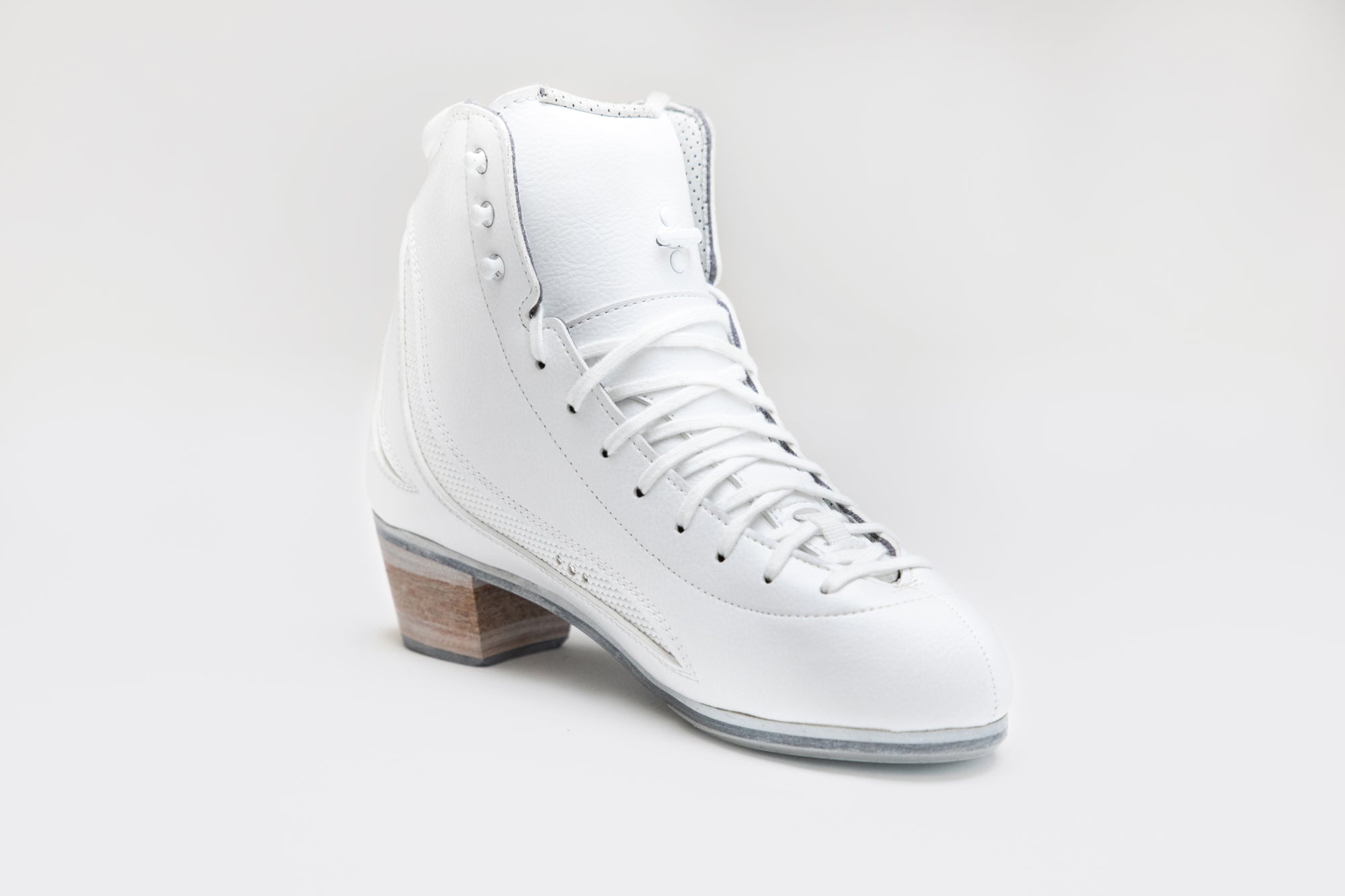 Front angled view of Riedell Elara womens figure skate boots with secure lacing system and high-cut ankle for superior support.