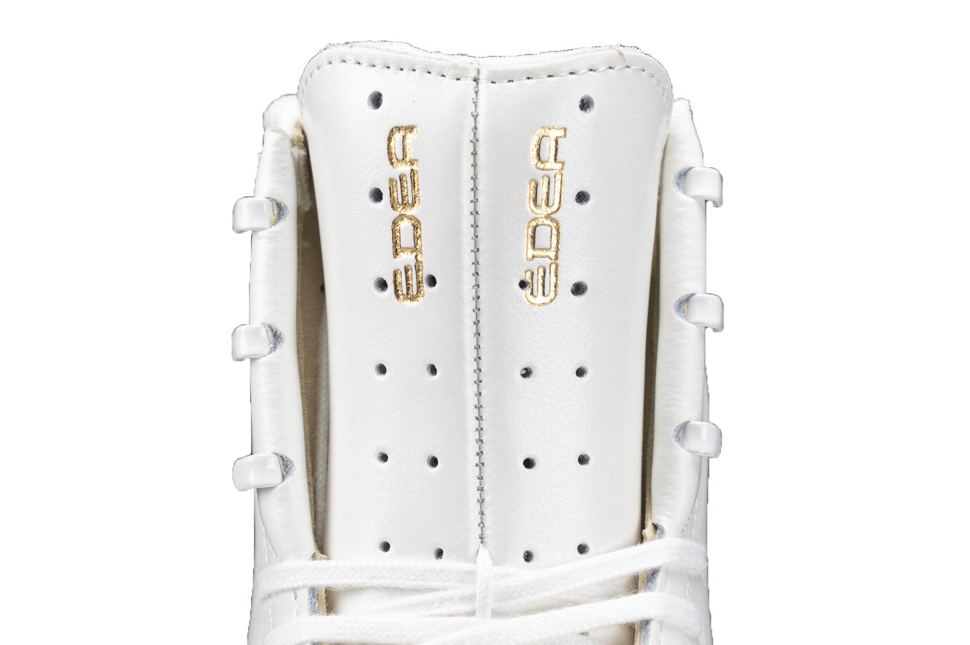 Top view of the Edea Flamenco skate tongue with dual gold logos and ventilation holes, offering comfort and breathability.