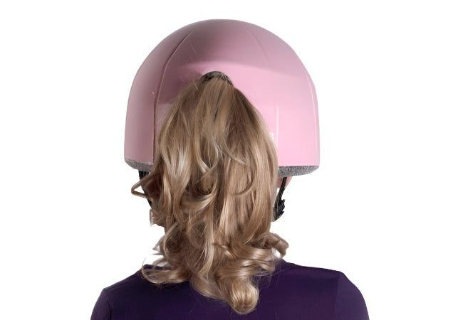 Back view of Wuevo Ice Skating Helmet in pink, designed with a ponytail cutout for comfort and style during skating sessions.