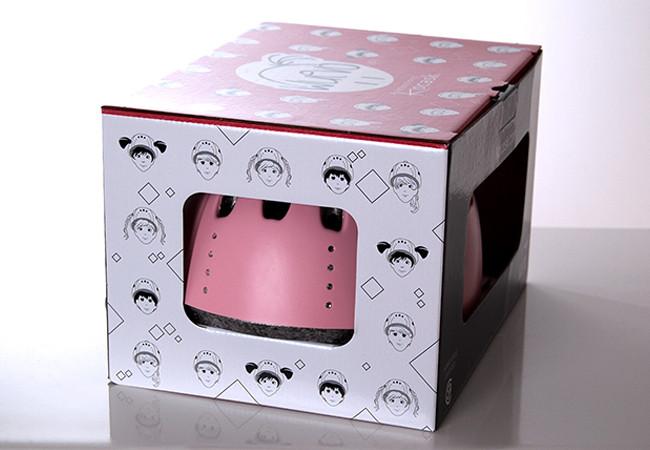 Wuevo Ice Skating Helmet in pink packaged in a branded box with viewing window, ideal for retail display and gifting.