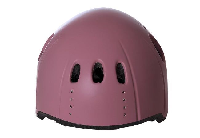 Front view of Wuevo Ice Skating Helmet in pink, featuring triple ventilation slots and sleek design for figure skating protection.
