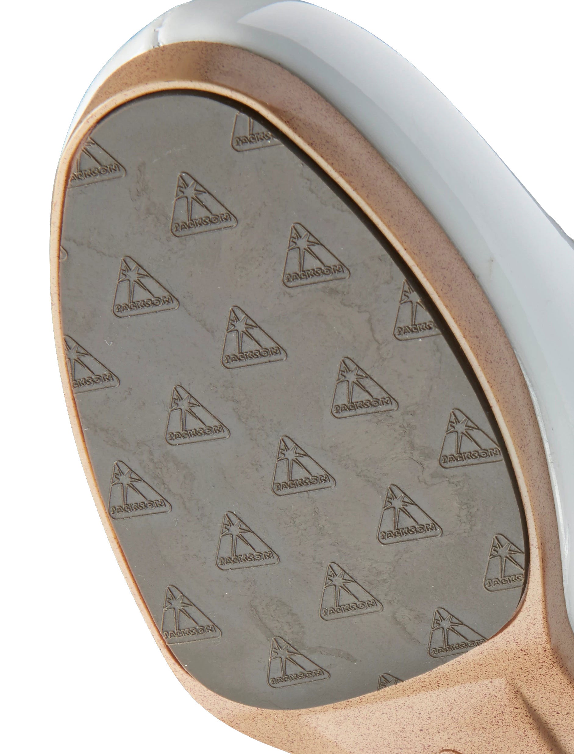 Close-up of Jackson Fusion Sole with embossed branding, offering lightweight strength and enhanced grip for figure skating performance.