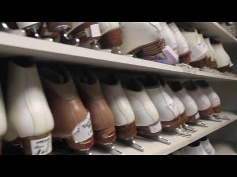 Close-up view of used ice skates with labeled tags, showcasing budget-friendly options for figure skating and recreational use.