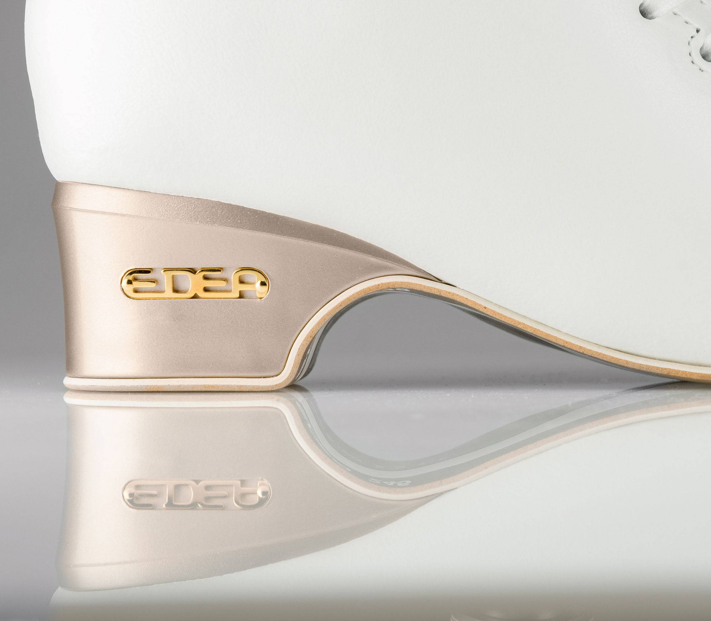 Close-up of Edea Concerto heel in champagne gold with embossed logo, showcasing premium Italian craftsmanship and stylish design.