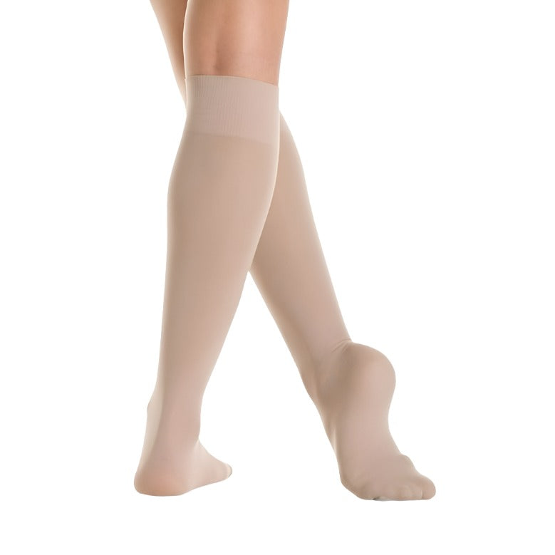 Beige knee-high microfiber socks on feet