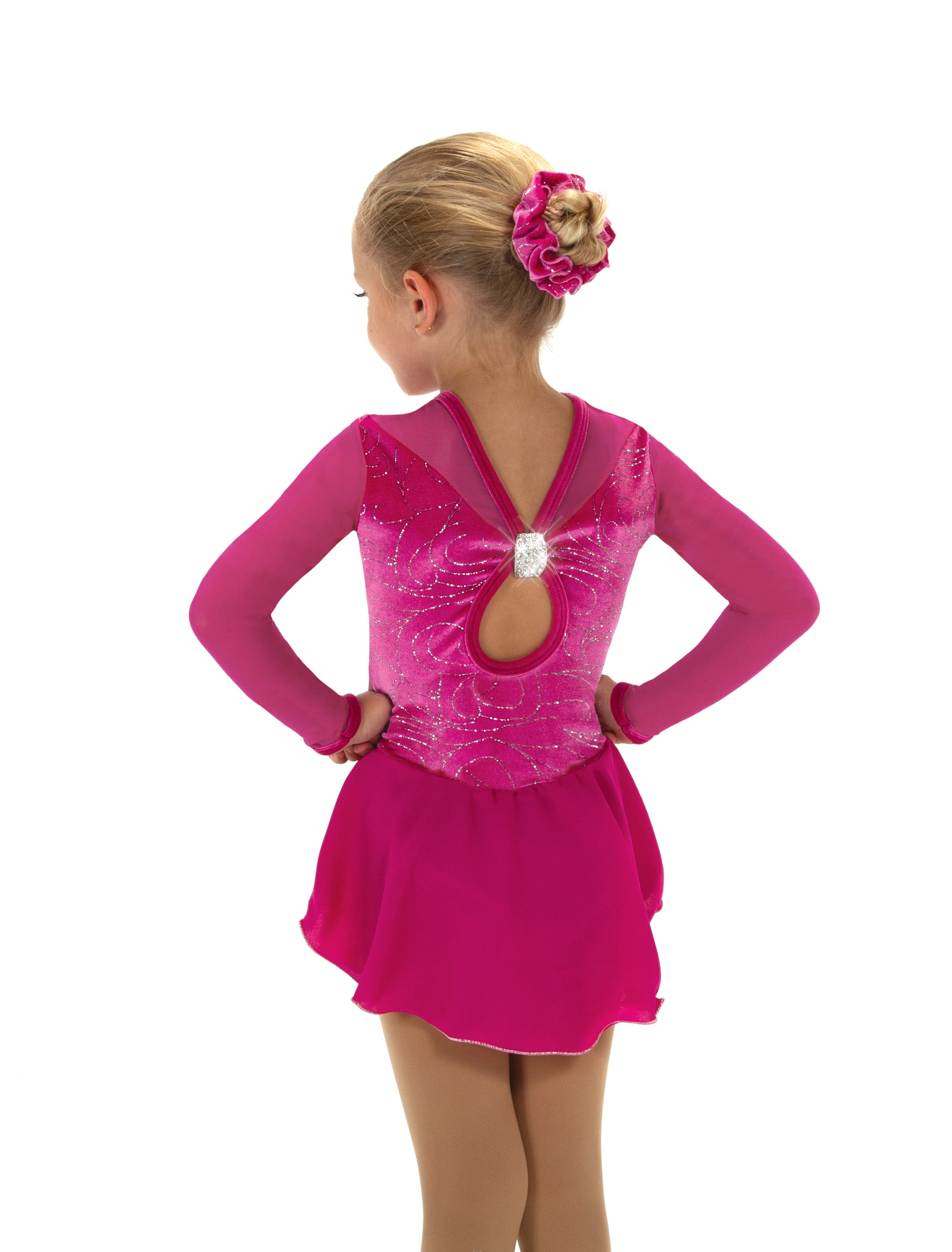 Fuchsia pink figure skate dress with open back design, rear view.